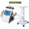 9-in-1 white beauty machine with touchscreen, multiple treatment wands, and a rolling metal storage trolley.