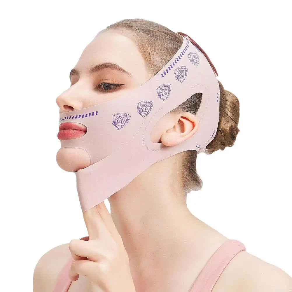 A woman wearing a pale pink, fabric V-line face-slimming strap with purple fan-shaped patterns on the sides.