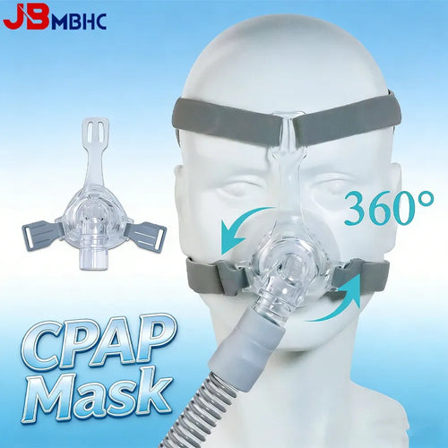 Clear CPAP mask for sleep apnea with gray headgear and 360-degree rotating elbow joint on a mannequin head.