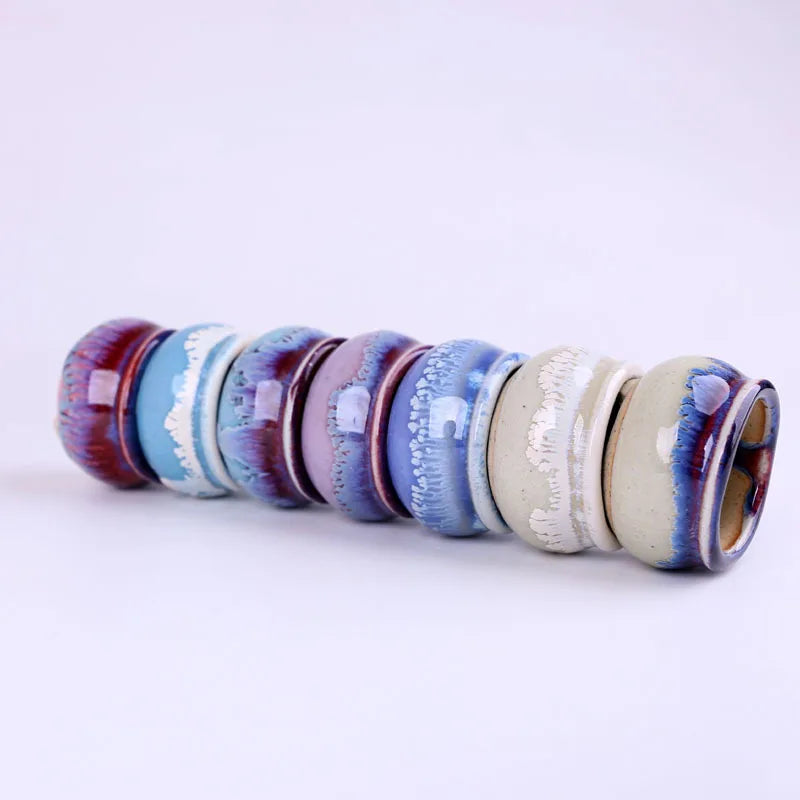 Mini ice-crack ceramic flowerpots, colorful side-by-side row with speckled glaze