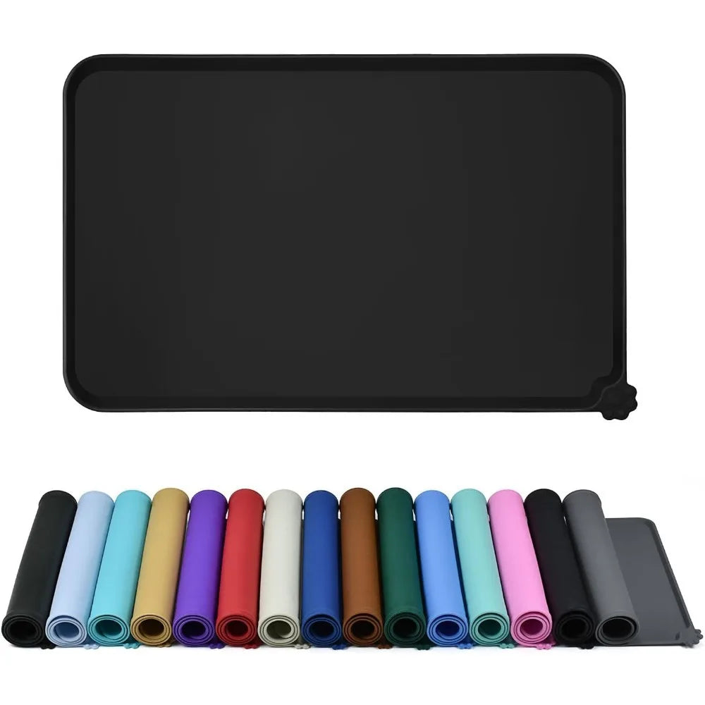 Waterproof silicone pet feeding mat with raised edges to prevent spills and protect floors, available in many colors.
