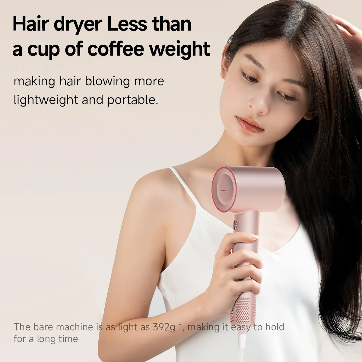 Woman using a lightweight, pink DOCO high-speed hair dryer with 110k RPM motor for professional home hair care.
