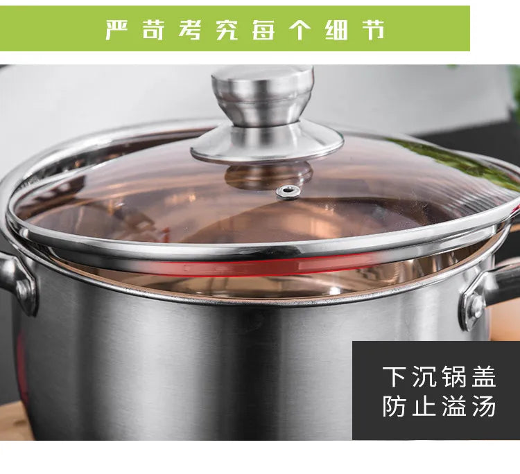 Stainless steel steamer pot with domed lid and side handles, close-up