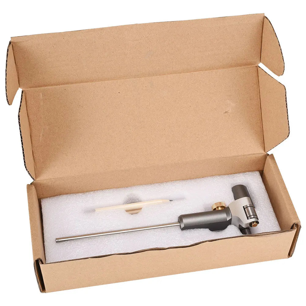 Wheel marking gauge tool kit in open cardboard box with foam insert