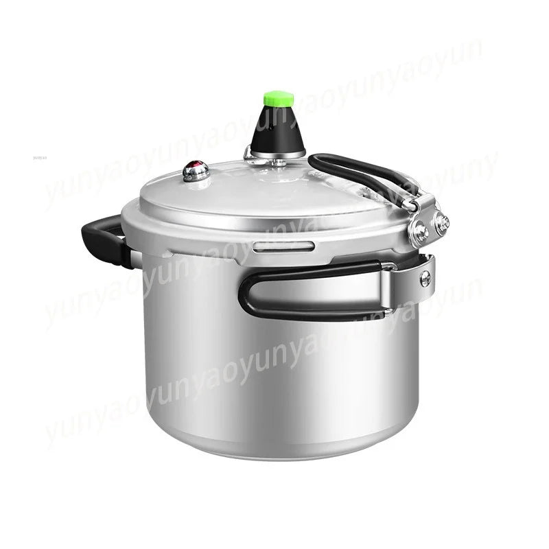 Portable pressure cooker with chrome pressure valve, silver pot and black carry grip.