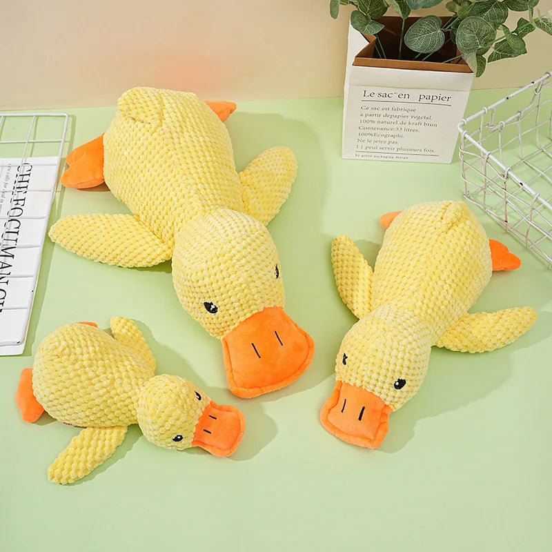 Bite-resistant yellow duck plush dog toys for interactive play and boredom relief. Durable texture for teething pups.