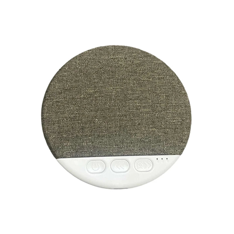 Compact grey white noise machine for sleep aid with white control buttons and timer display lights.