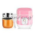 Pink mini rice cooker with inner pot and control display, side view