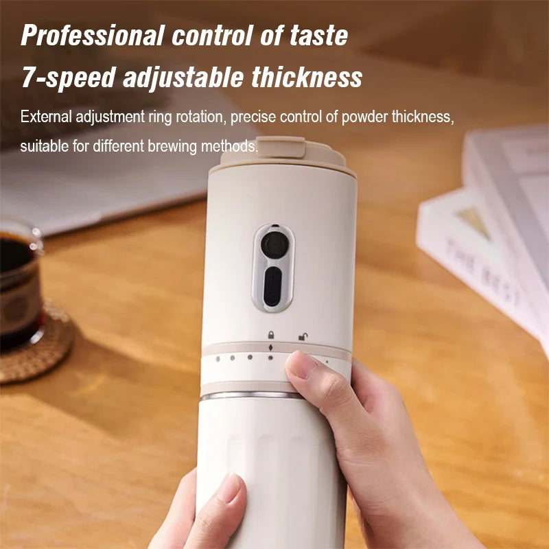 Beige portable coffee grinder with 7-speed thickness adjustment ring and manual locking mechanism.