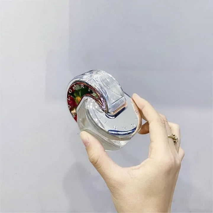 Bvlgari Omnia Crystalline Eau de Toilette for women. Silver interlocking circular bottle. Iconic designer floral scent.