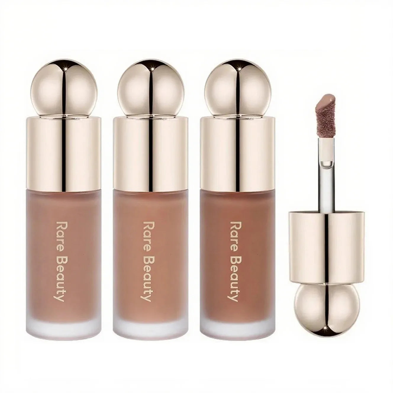 Rare Beauty liquid contour trio with doe-foot applicator, featuring matte nude shades in elegant metallic-capped bottles.