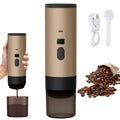 Portable gold electric coffee grinder with digital display, USB charging cable, and coffee beans on white background.