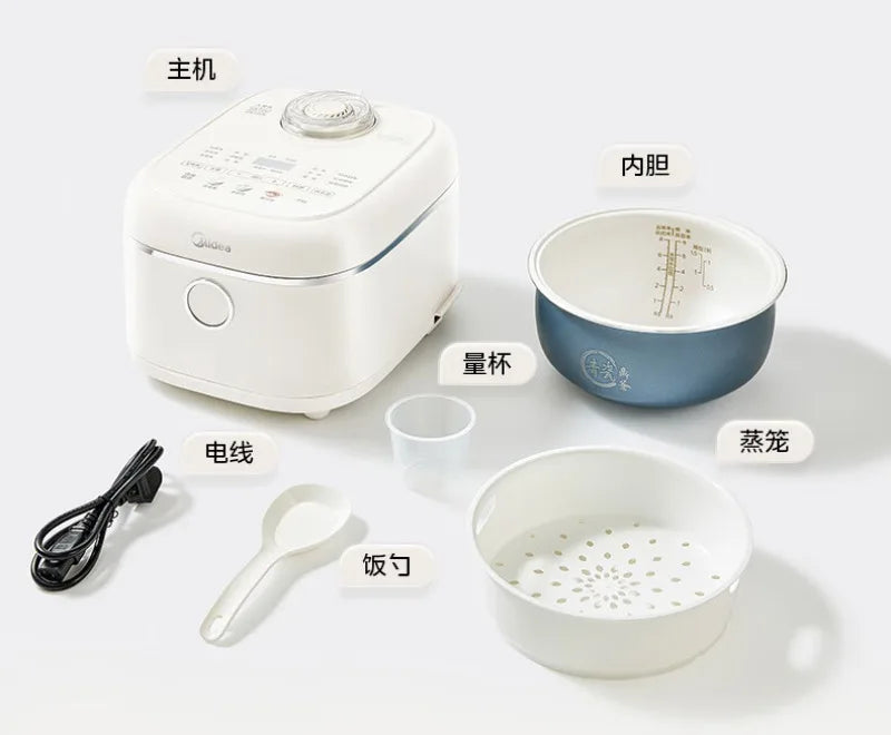 White Midea rice cooker with accessories: inner pot, steaming tray, measuring cup, spatula, cord