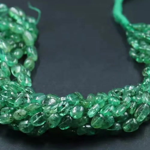 Smooth green oval bead strand with glossy finish, for jewelry making