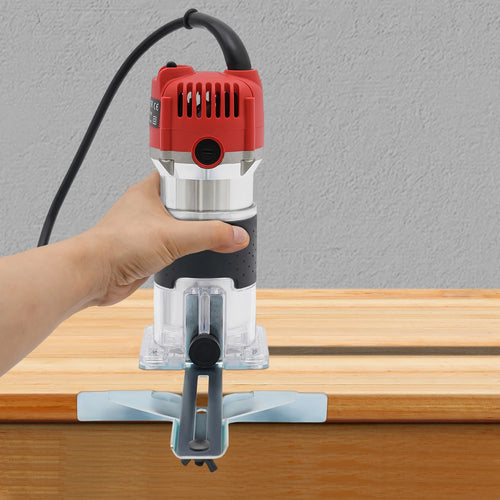 Red and black electric wood router trimmer with transparent base and side depth knob