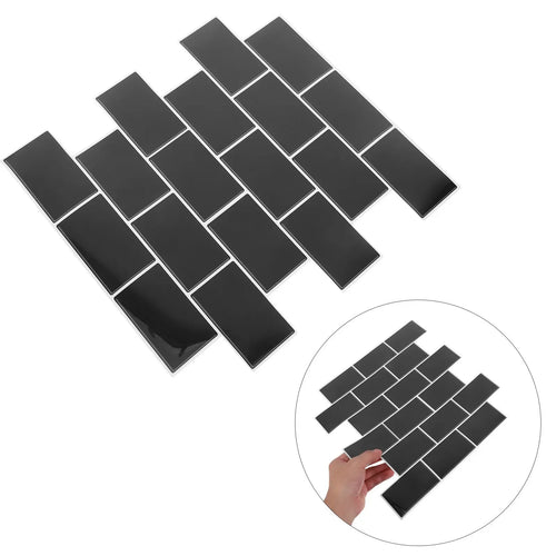 Black peel-and-stick subway backsplash tile sheet with glossy staggered rectangles