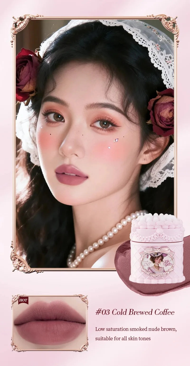 Vintage strawberry cake lip mud in #03 Cold Brewed Coffee. Matte velvet mousse lipstick with a soft focus nude finish.