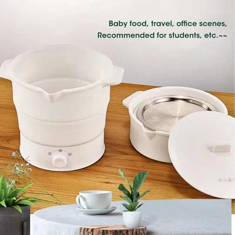 Portable folding electric hot pot with lid and dial control, white.