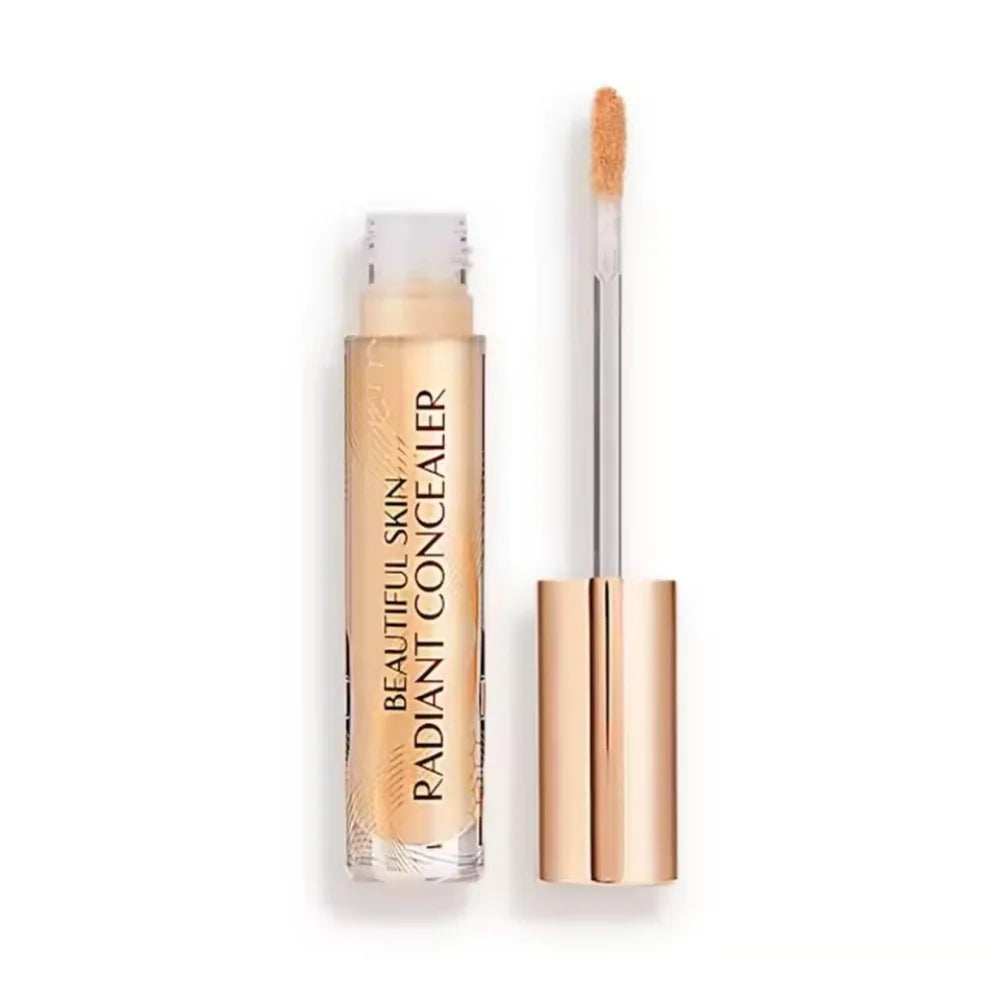 Charlotte Tilbury Beautiful Skin Radiant Concealer with doe-foot applicator in a gold tube for a smooth, glowy finish.