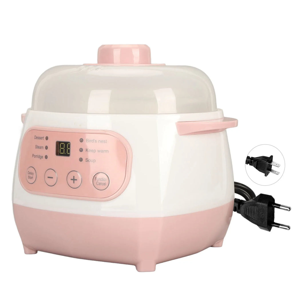 Pink mini electric rice cooker with clear lid, LCD panel, and power plug on the side