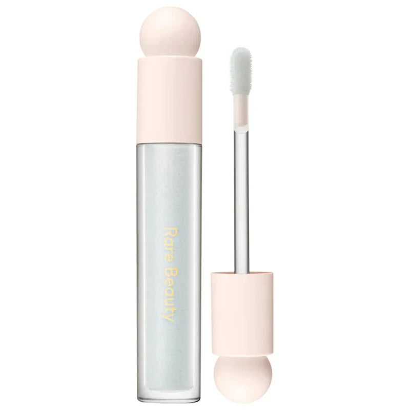 Rare Beauty Soft Pinch Tinted Lip Oil with doe-foot applicator in a clear, moisturizing gloss tube.