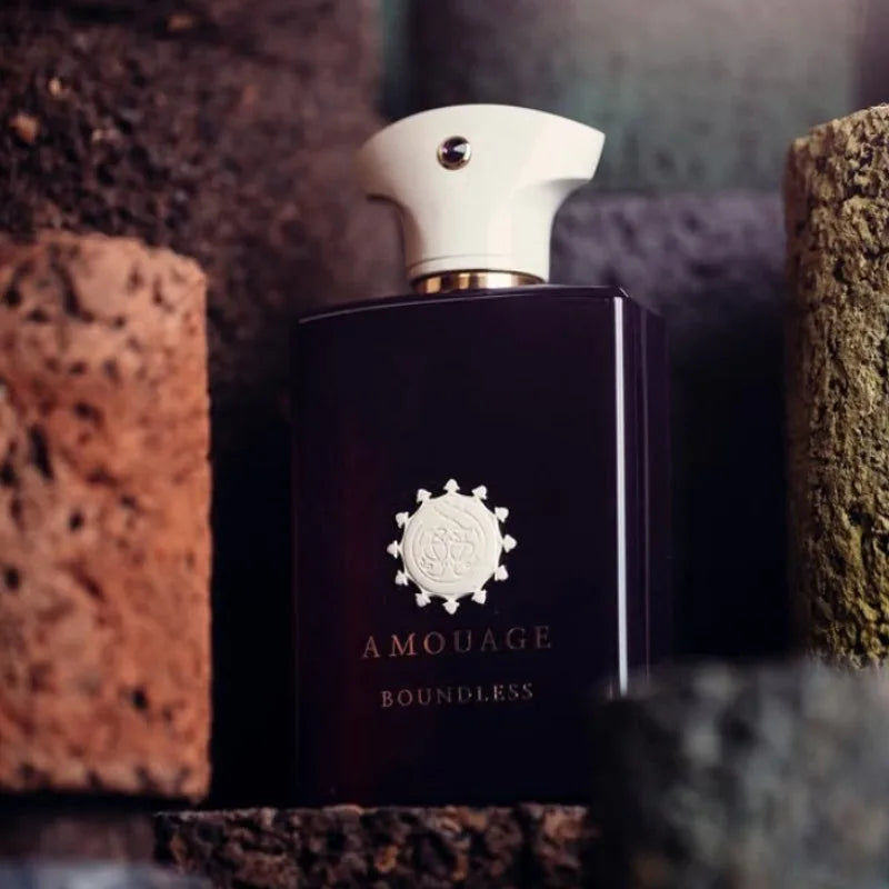 Amouage Boundless 100ml Men EDP: Dark rectangular bottle, woody aromatic, long-lasting masculine scent for him.