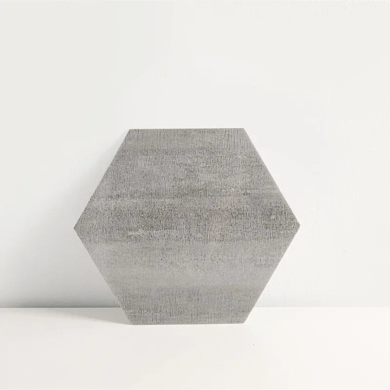 Hexagon wood-grain vinyl peel-and-stick floor tile, dark gray with subtle texture