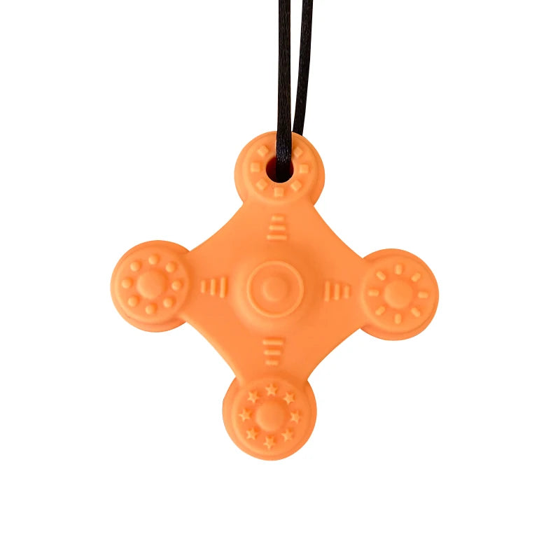 Orange silicone teething toy for baby relief.