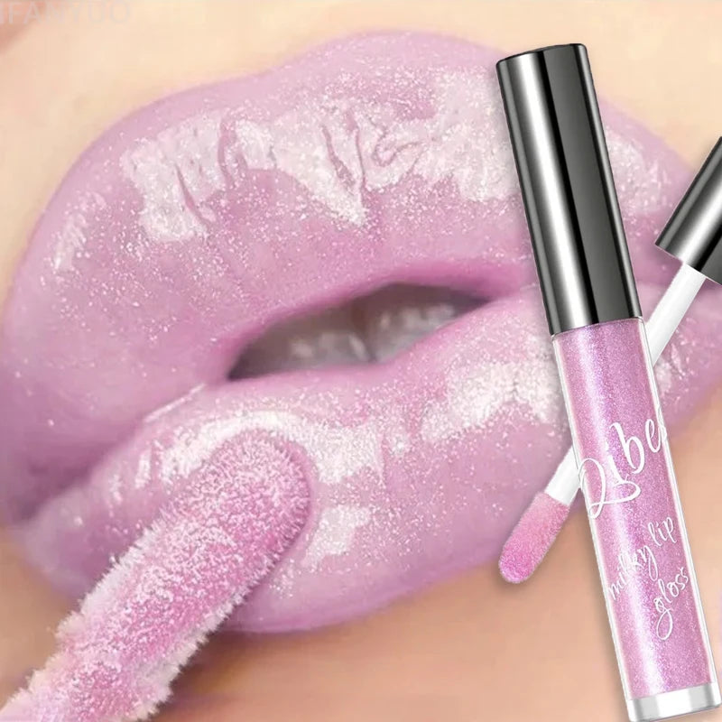 Shimmering taro purple lip gloss with gold sparkle for a moisturizing, plumping, glassy jelly shine finish.