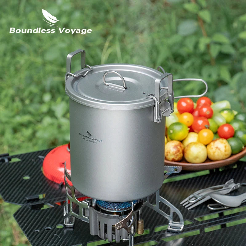 Titanium pot rice cooker set with lid on camp stove, grey pot and handles