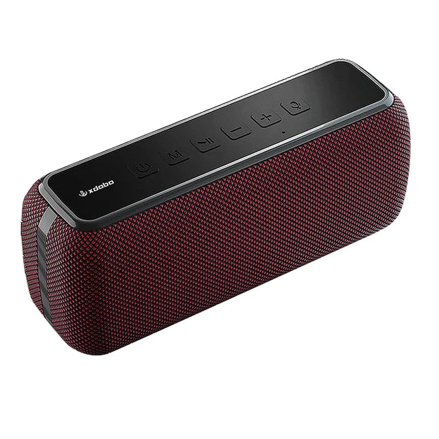 Wine red Bluetooth speaker with top button controls and textured fabric grille
