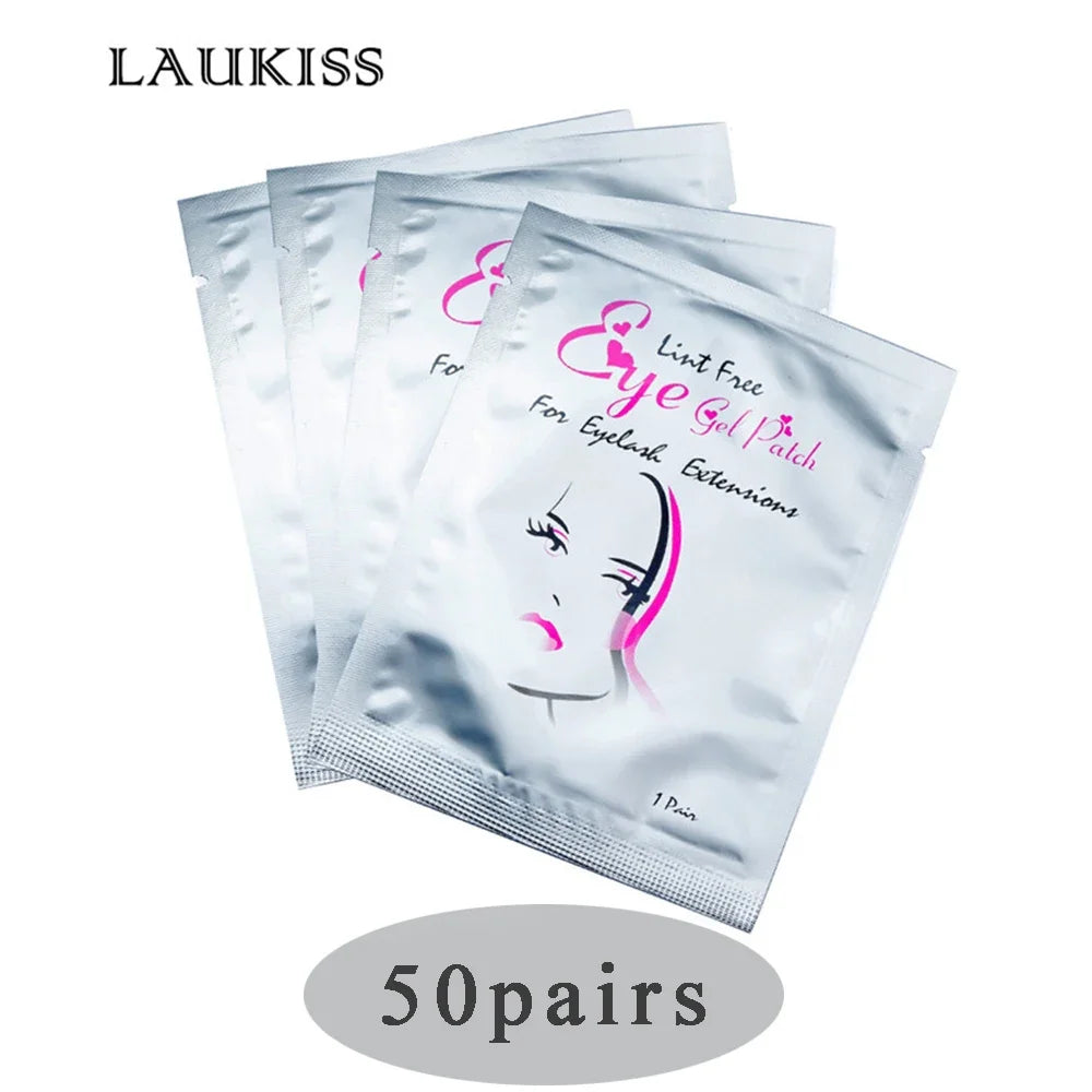 Silver foil lint-free under-eye gel patches for eyelash extensions in individual sachets. Beauty salon supply.