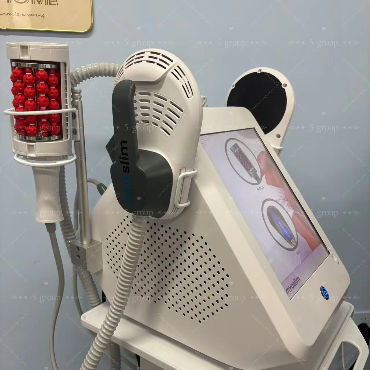 White EMS body sculpt machine with red ball roller applicator, touchscreen interface, and professional fat burning gear.