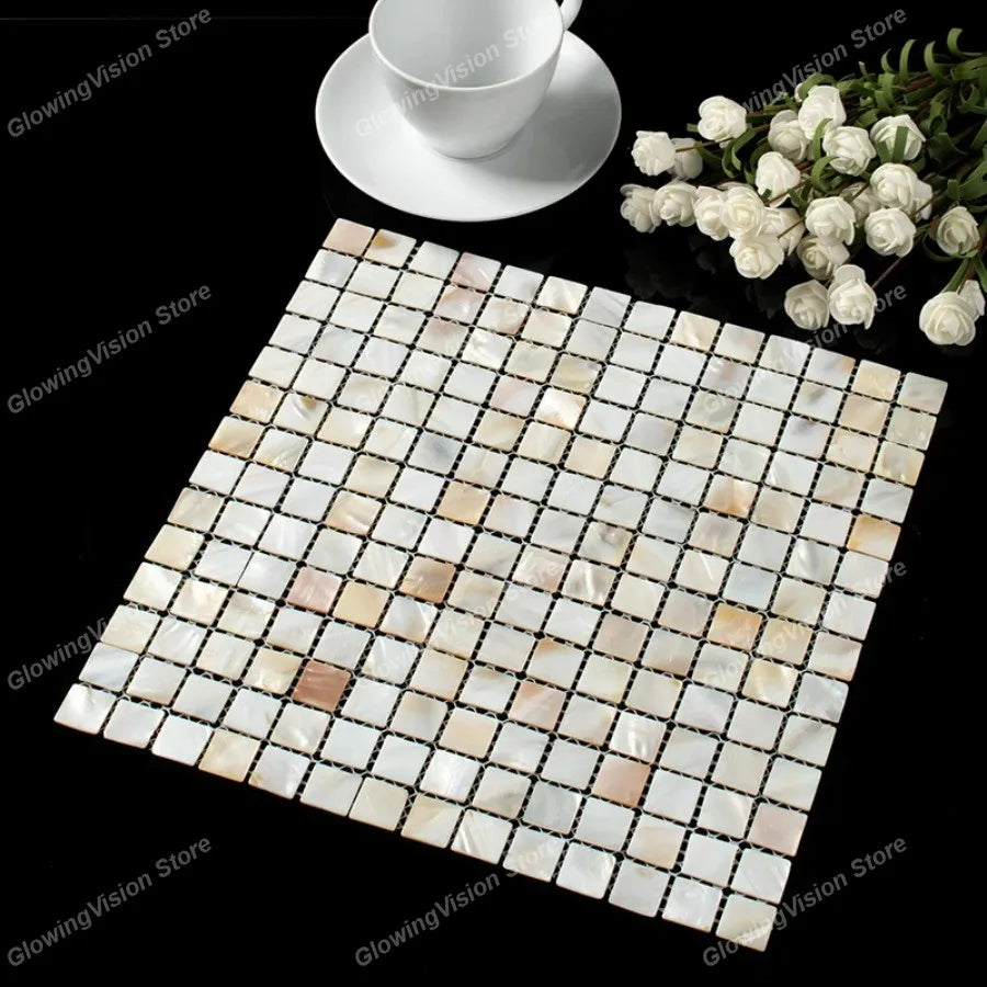 Natural mother-of-pearl mosaic tile sticker sheet with dark grout lines and beige squares