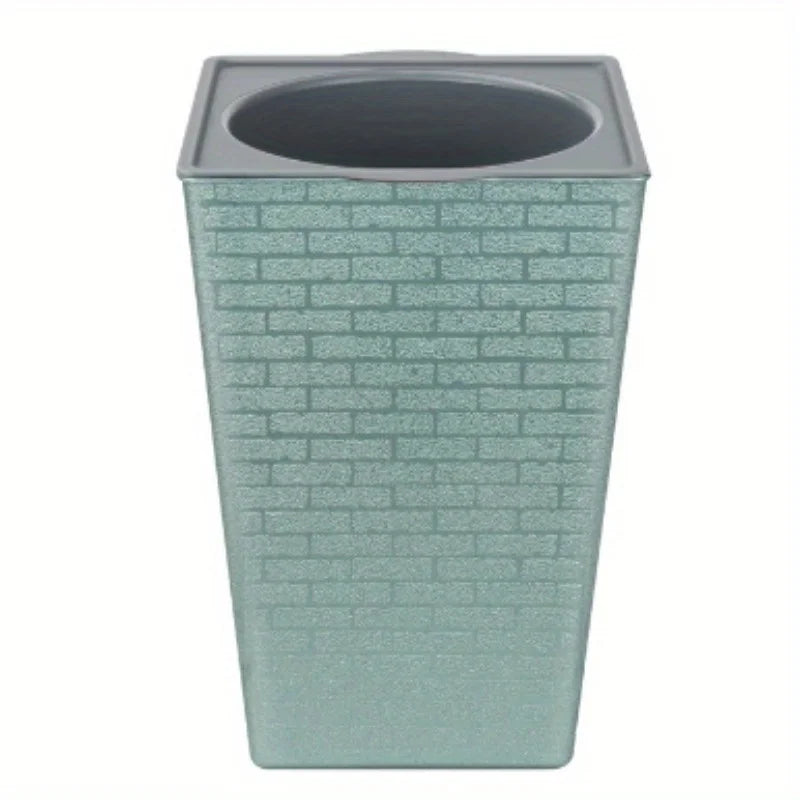 Teal plastic brick-pattern flower pot with grey rim and dark round top opening