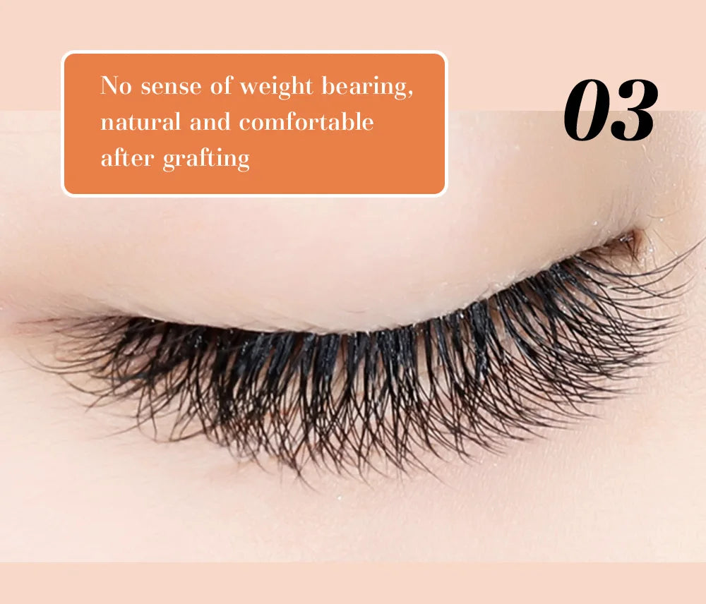 Close-up of black DeceMars 6D-W shaped eyelash extensions applied to a closed eyelid for a natural, wispy look.