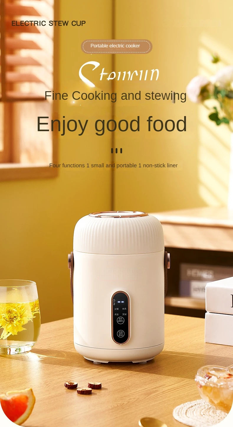 White portable electric stewing cup slow cooker on table