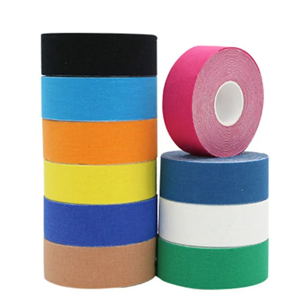A stack of various colorful rolls of anti-wrinkle face lifting tape in assorted bright and neutral shades.