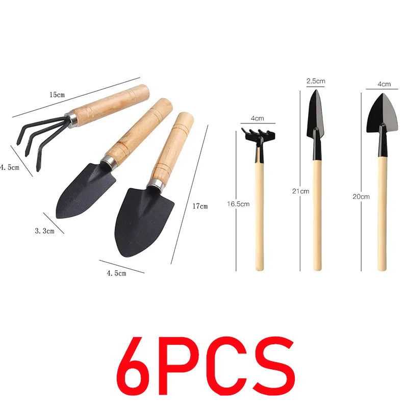Mini garden hand tool set with black metal heads and light wood handles, 6-piece