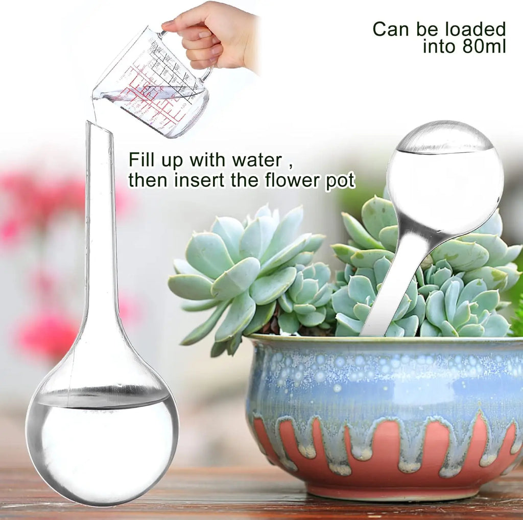 Transparent watering bulb with globe reservoir for filling and inserting into soil