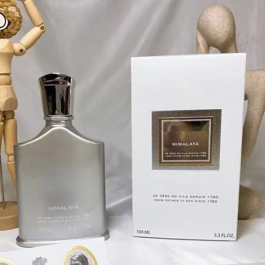 Creed Himalaya 100ml men's cologne, silver metallic flask bottle, luxury long-lasting citrus woody fragrance.