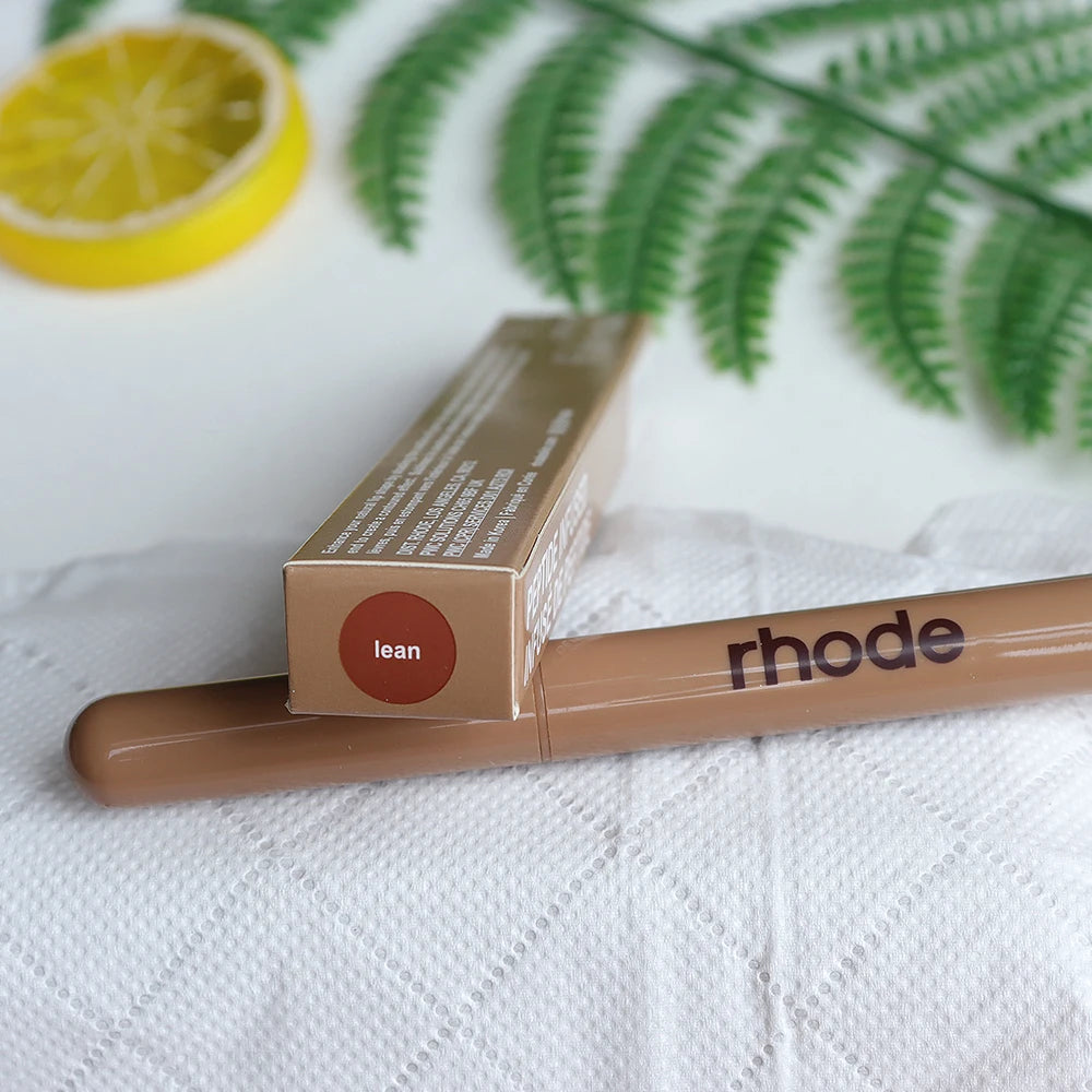 Rhode Peptide Lip Shape Pen in shade Lean. Long-lasting beige lip liner pencil with a smooth, matte finish.