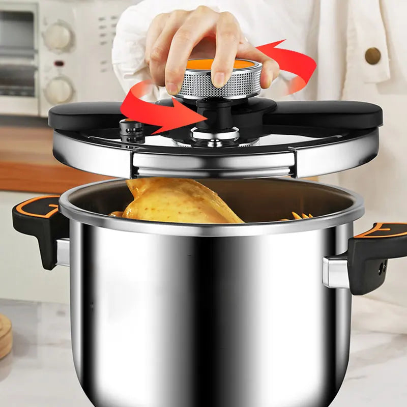 Stainless steel pressure cooker with lid open, vent filter, and locking knob
