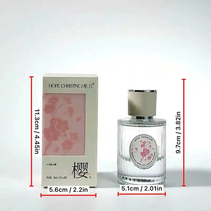 Hope Christine Sakura floral women's perfume, long-lasting cherry blossom scent in a round, ribbed glass bottle.