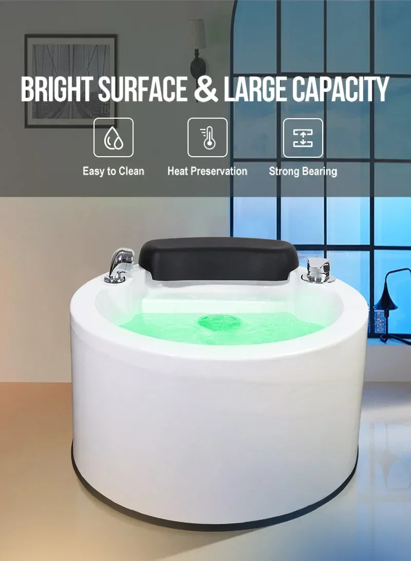 White hydro-massage foot spa with green-lit water, black headrest, chrome controls