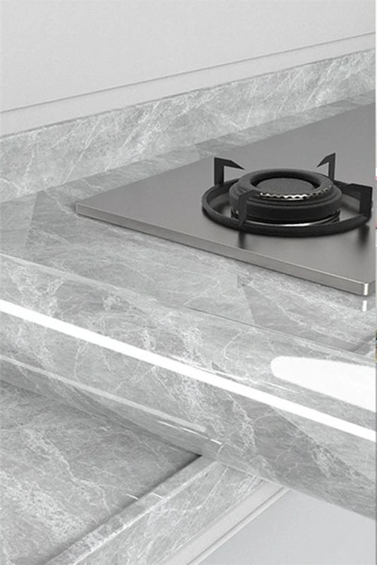 Self-adhesive gray marble wallpaper strip for cabinets, textured veining close-up