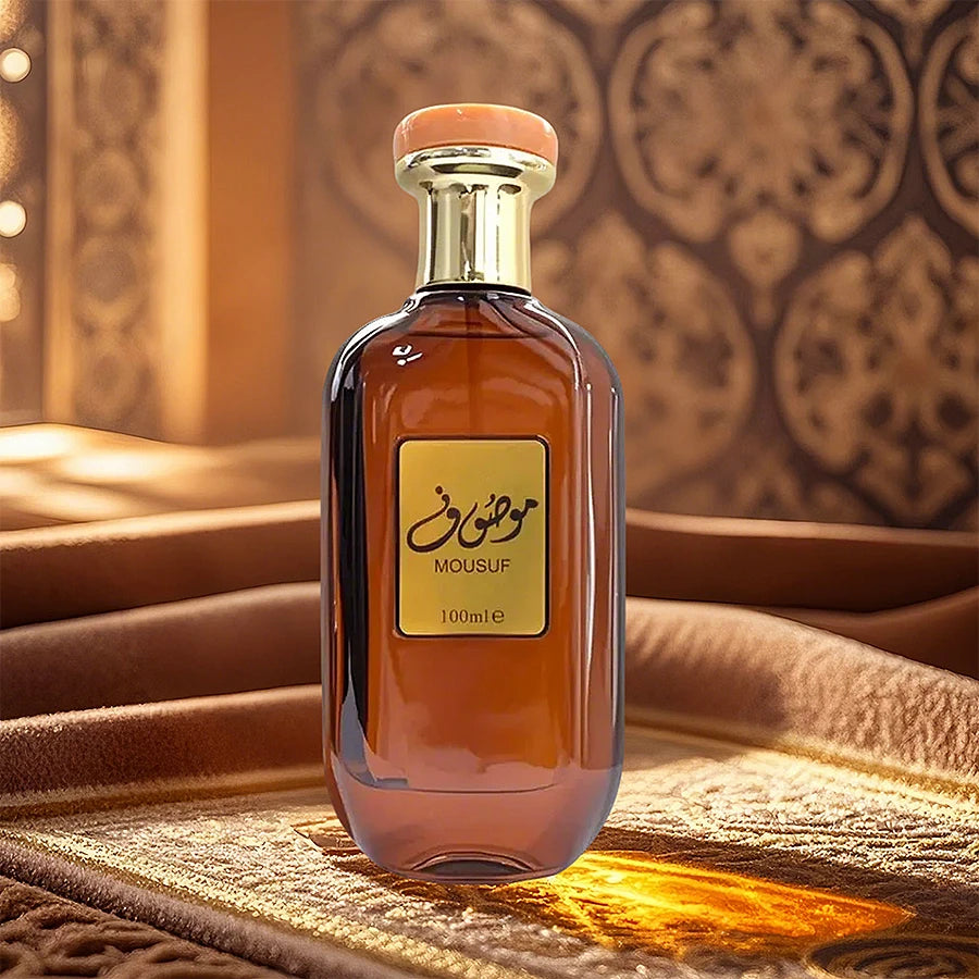 Mousuf Intense 100ml EDP: Unisex Arabian perfume in a sleek amber glass bottle with gold cap. Sweet, musk scent spray.