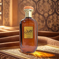 Mousuf Intense 100ml EDP: Unisex Arabian perfume in a sleek amber glass bottle with gold cap. Sweet, musk scent spray.