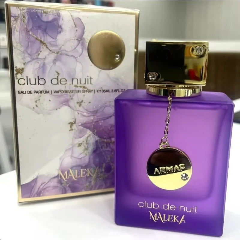 Armaf Club de Nuit Maleka 105ml EDP: Purple square bottle with gold charm, luxury seductive scent for men and women.