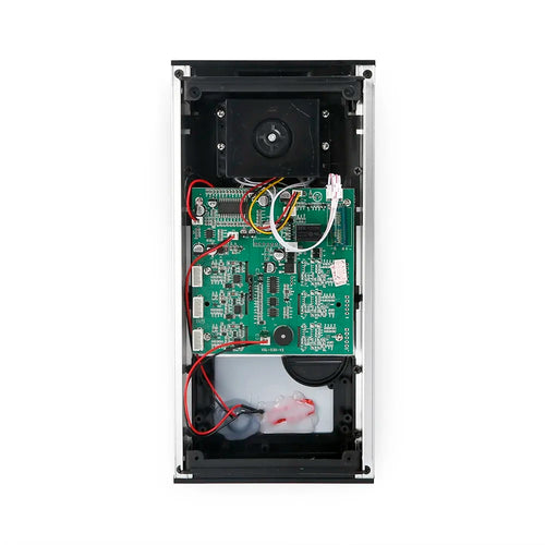 Open video intercom outdoor unit showing internal circuit board and wiring